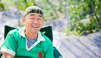 笑顔で話す佐々木敬仁さん